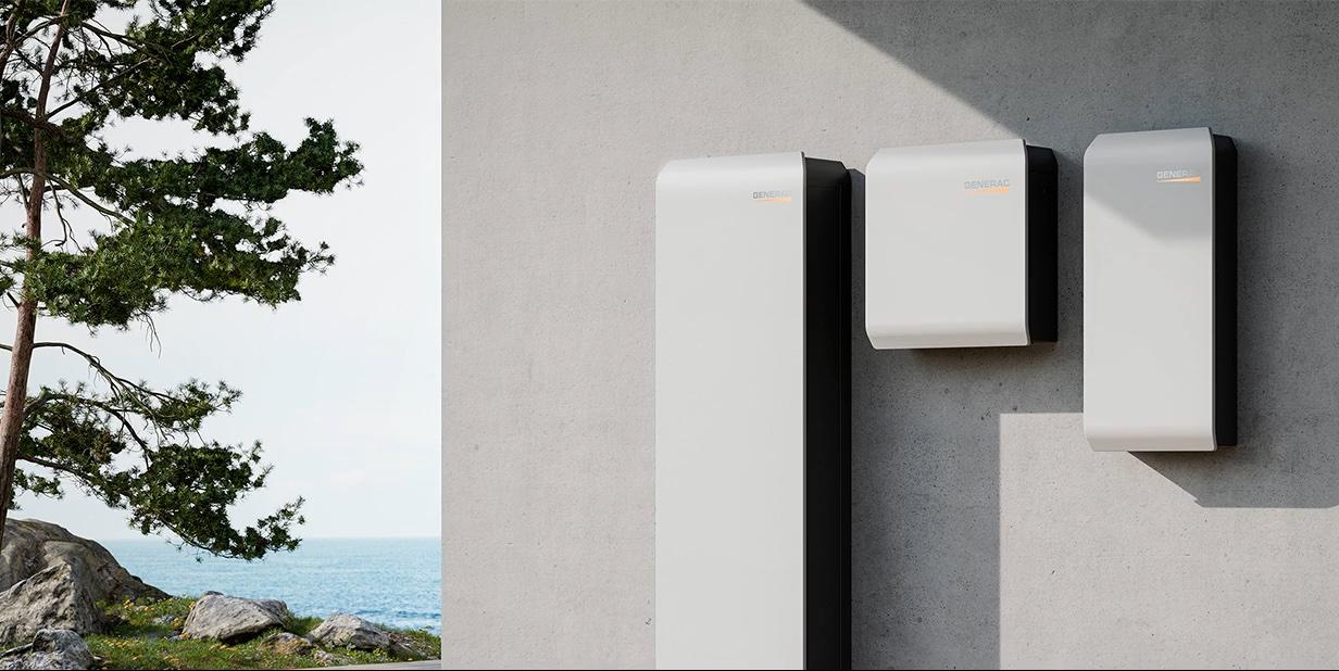 Generac PWRcell battery storage units mounted on an exterior wall.